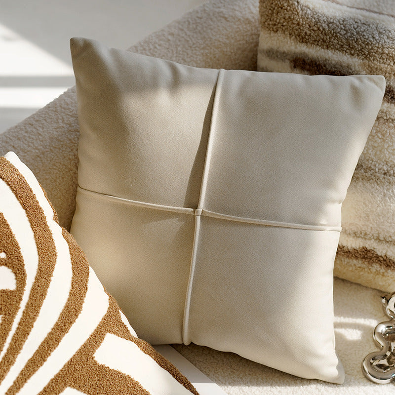 Housse de coussin beige croix