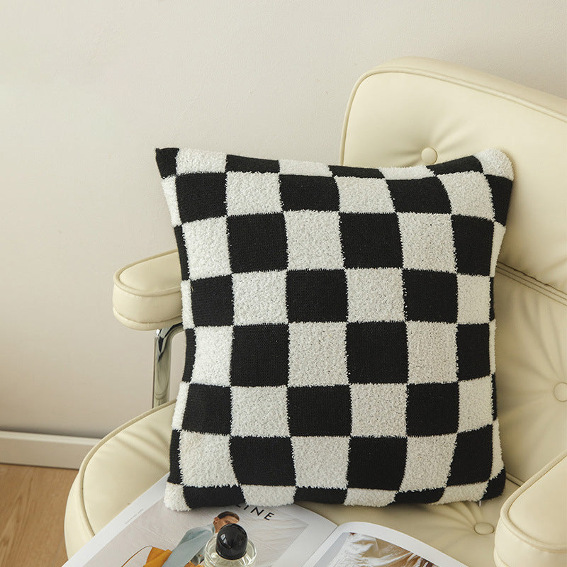 Housse de coussin damier coloris noir