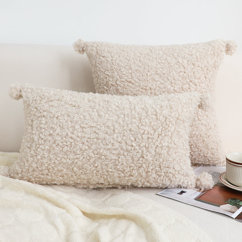 Coussin bouclette coloris beige