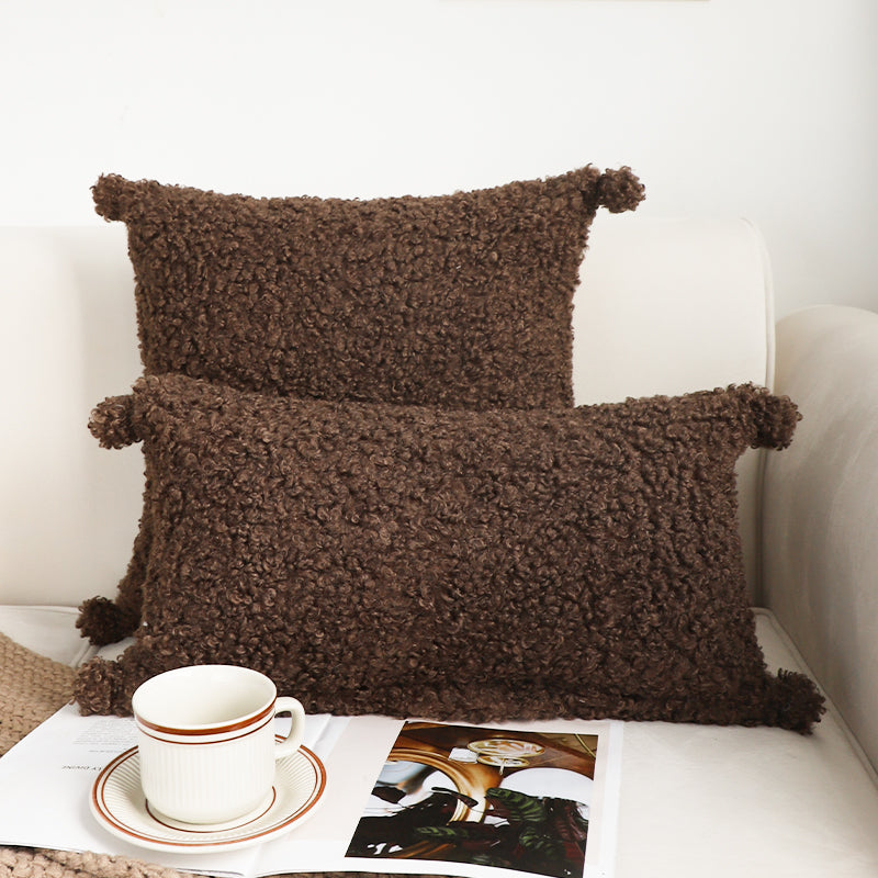 Coussin bouclette coloris café