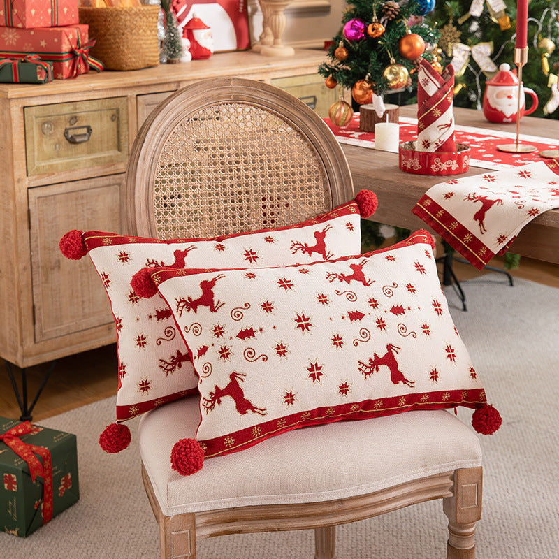 Coussin jacquard de Noël motif renne, fond rouge