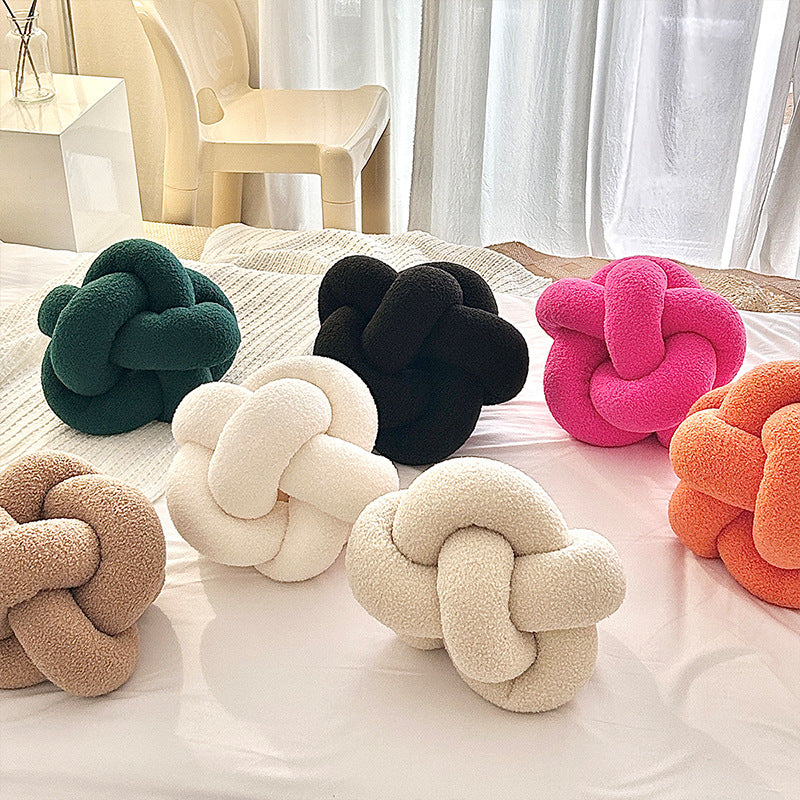 Détail du tressage du coussin nœud