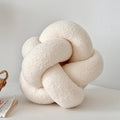 Coussin nœud tressé coloris beige