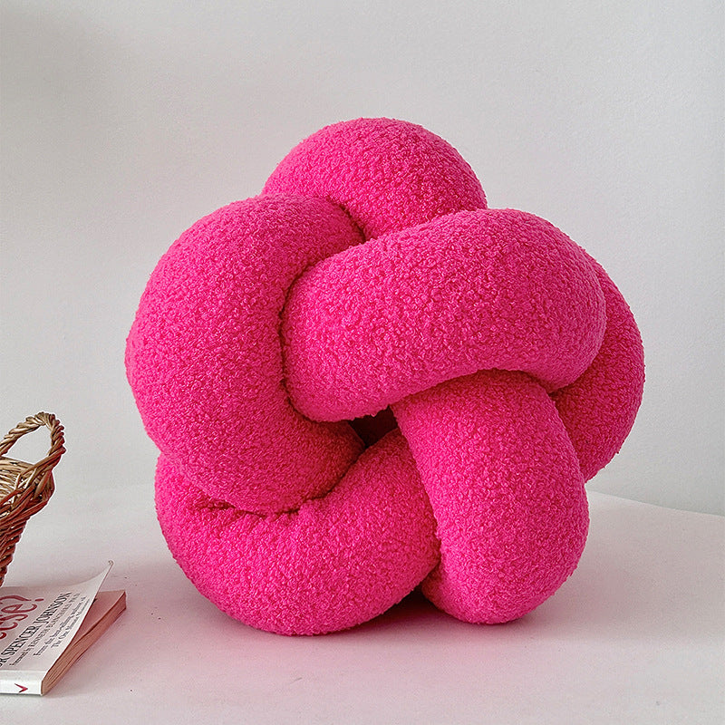 Coussin nœud tressé coloris fuchsia
