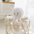 Peluche poulpe réversible coloris blanc