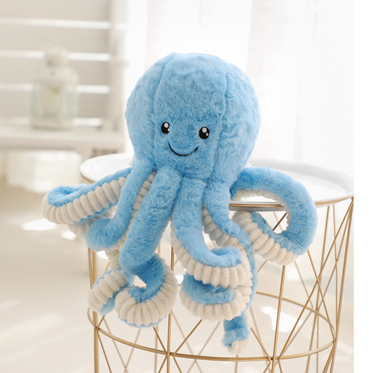 Peluche poulpe réversible coloris bleu