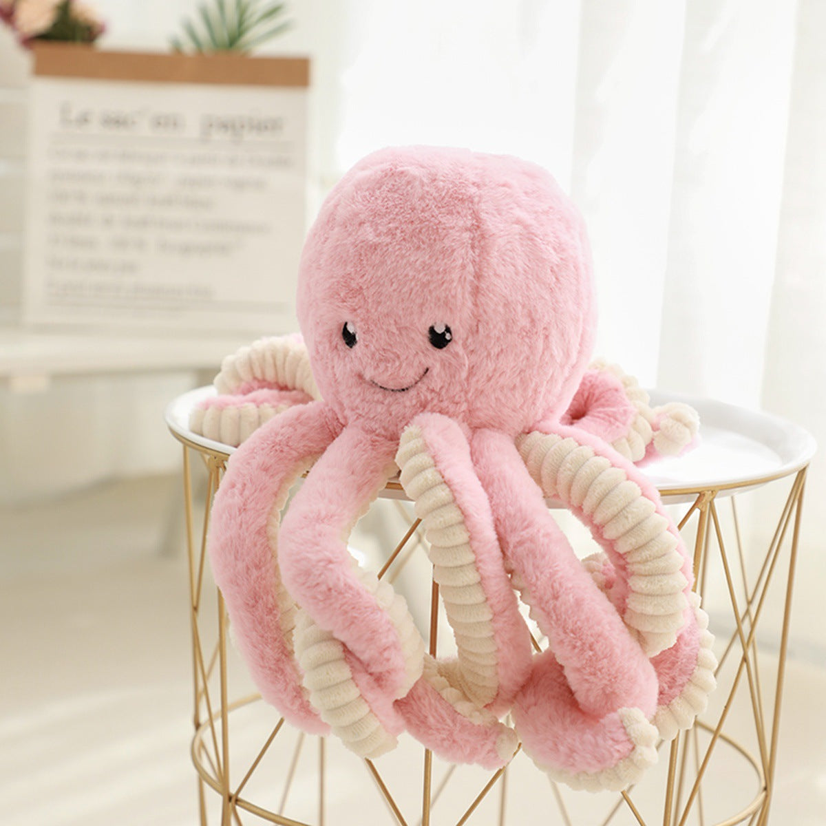Peluche poulpe réversible coloris rose