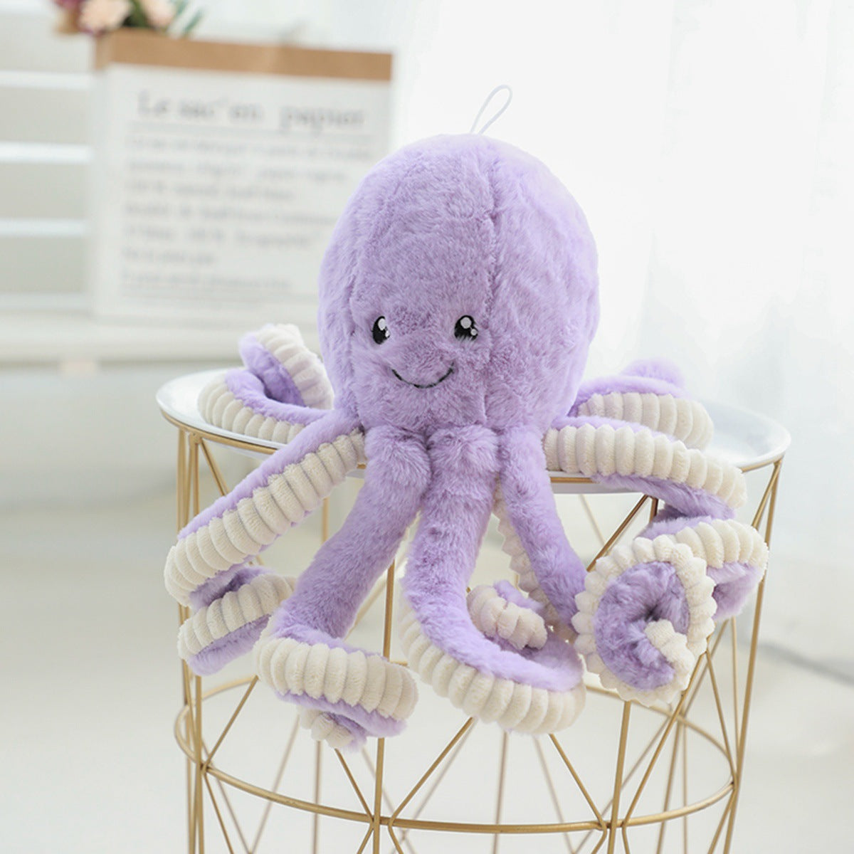 Peluche poulpe réversible coloris violet