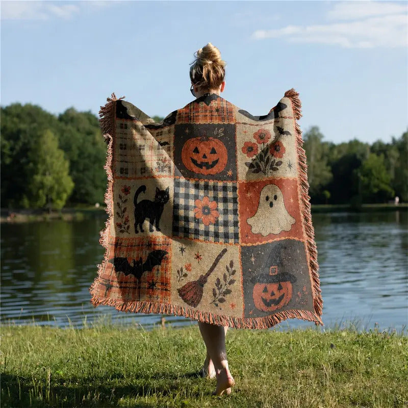 Détail du motif citrouille fantôme du plaid