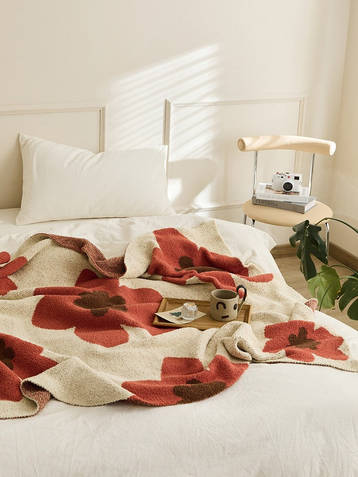 Plaid Fleur bordeaux en gros plan