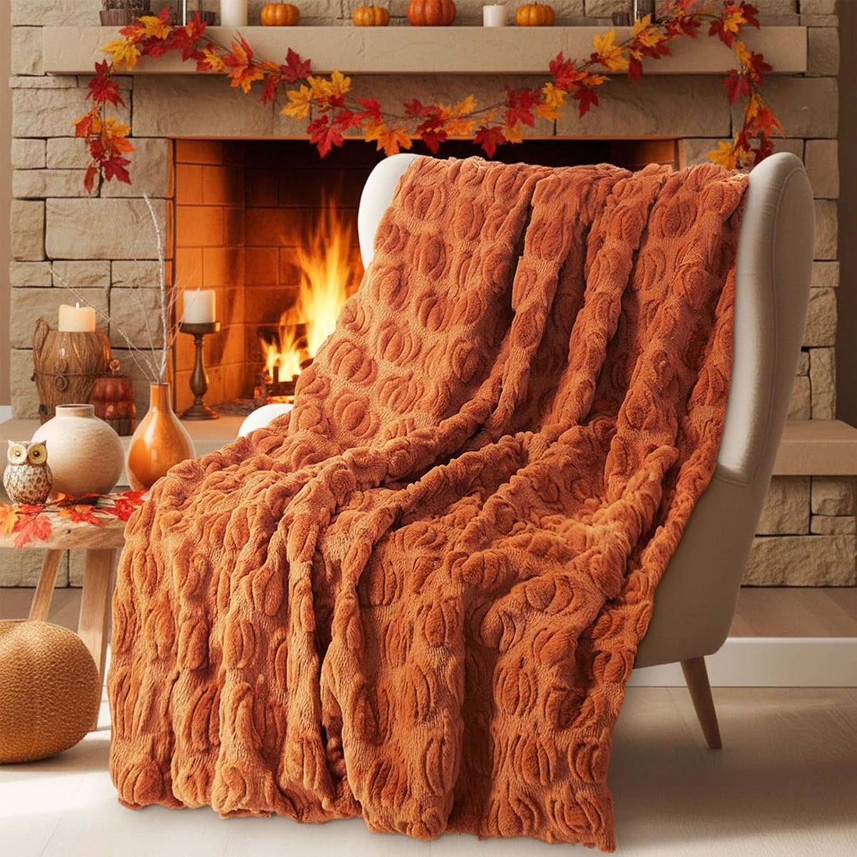 Plaid Halloween motif citrouille orange sur un canapé