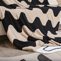 Plaid tricoté Vague coloris noir